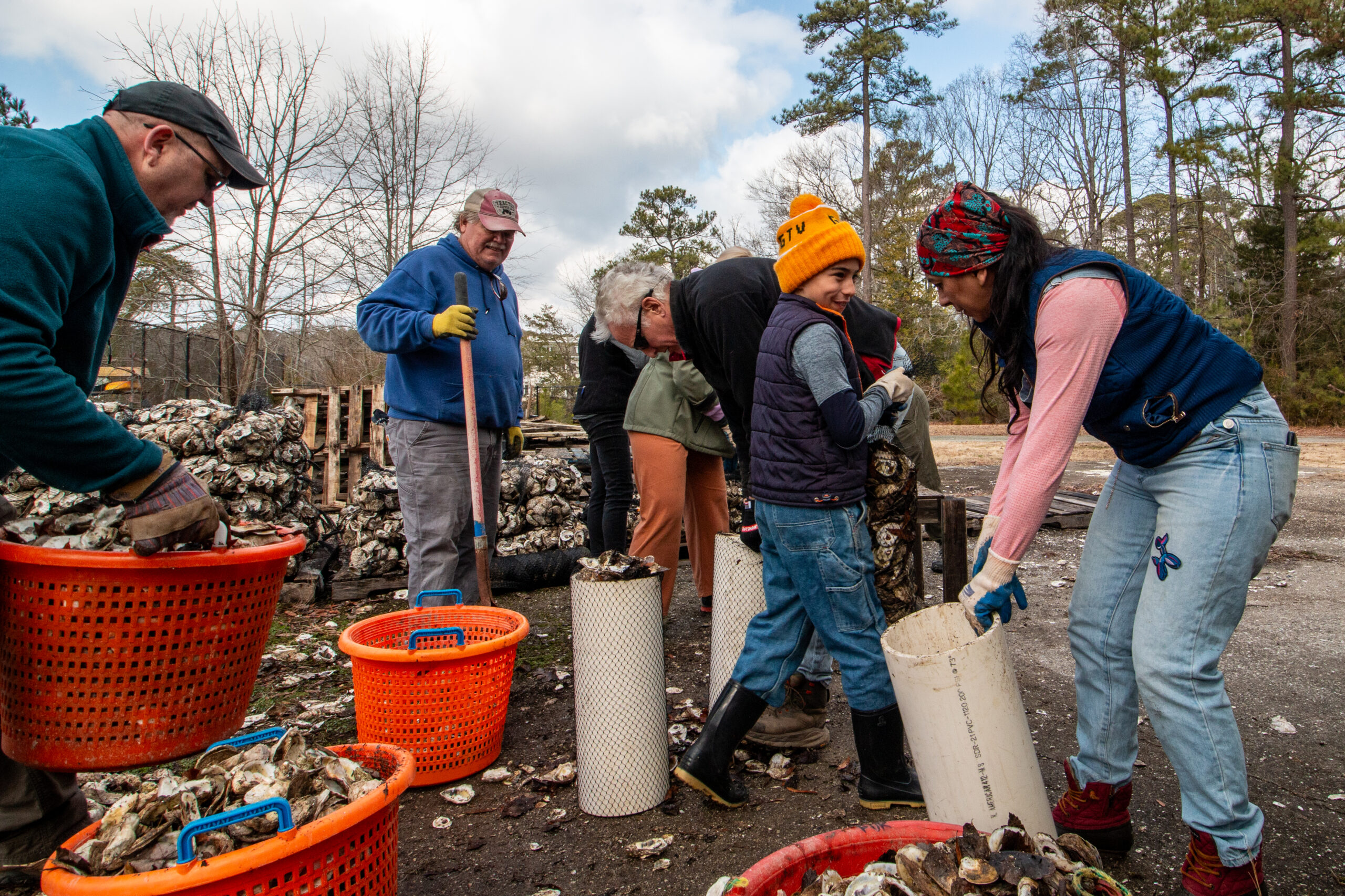 Volunteers bagging oyster shell for reef restoration